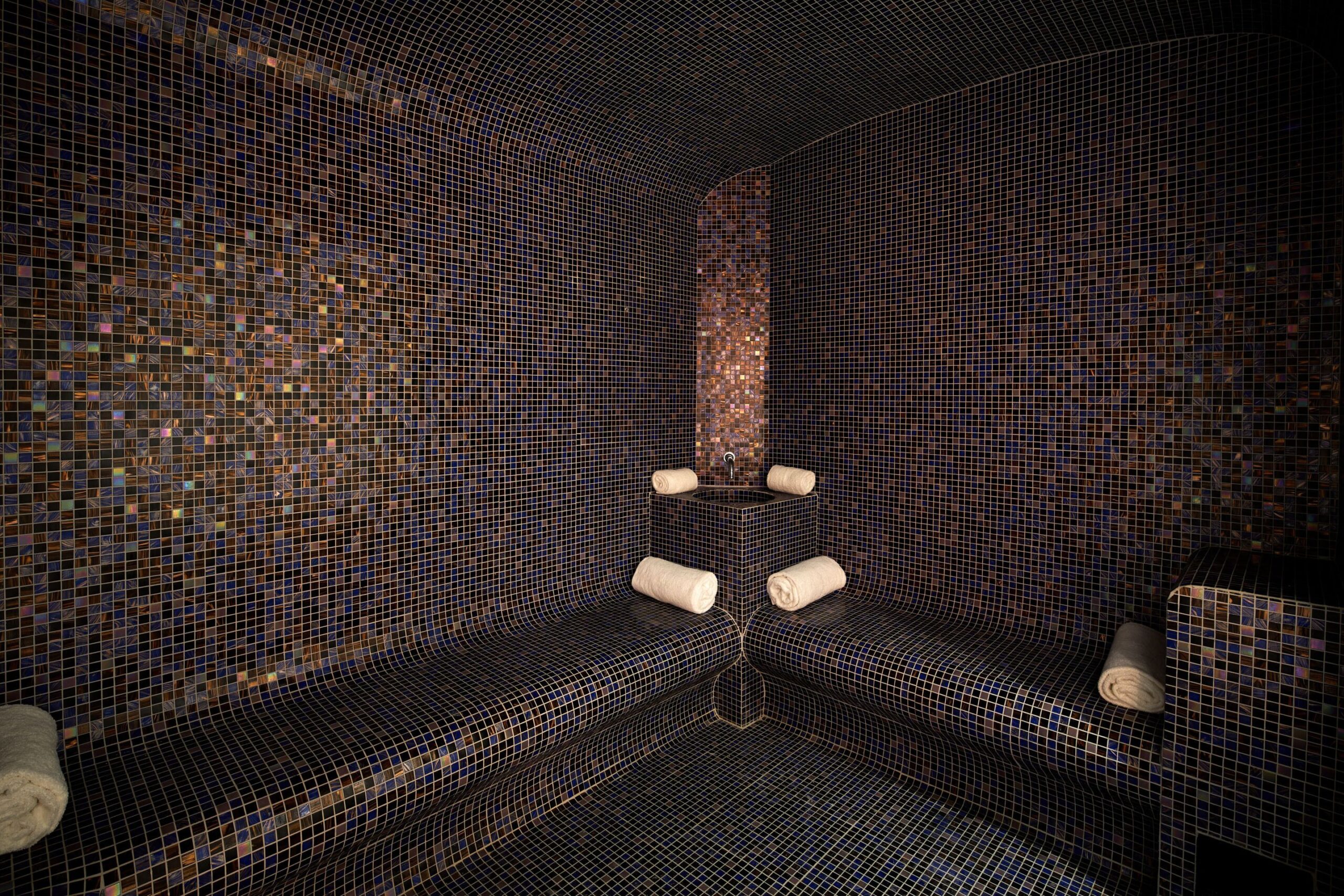 Black tile turkish bath, with two places to lay down in